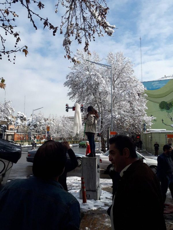 Woman protesting in Iran